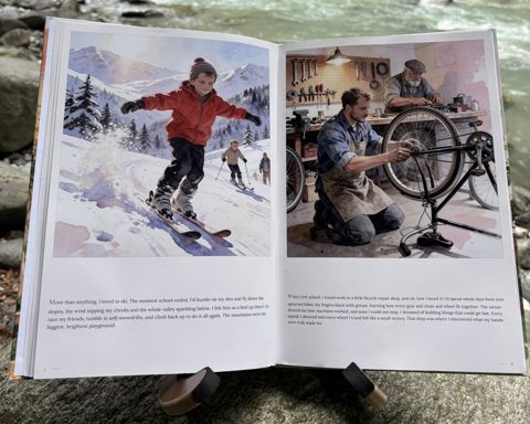 The printed book “Who is Opa?” by a river: Open at spread 4